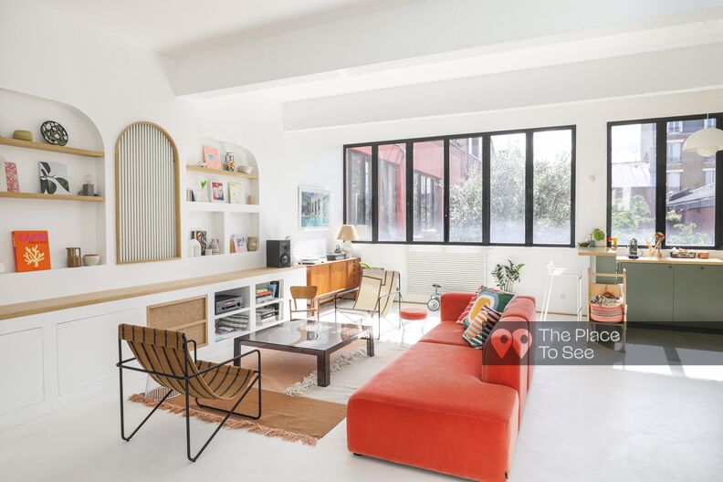Graphic and sleek decor for this loft with a rooftop terrace