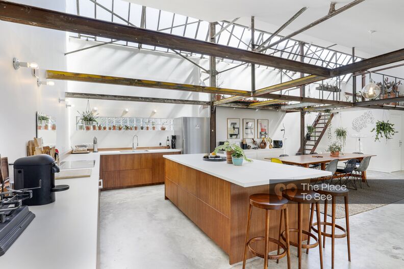 Industrial loft with large glass roof