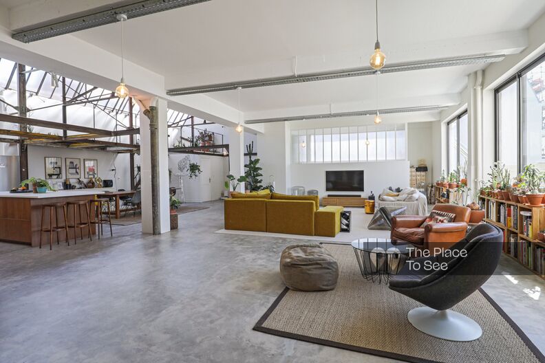 Industrial loft with large glass roof