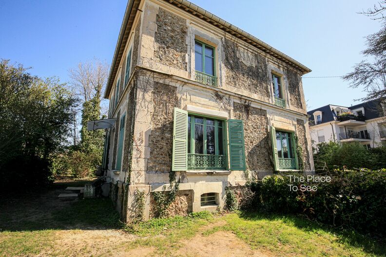 Empty and faded millstone house