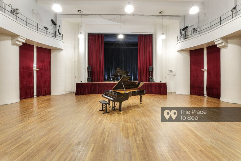 Art Deco concert venue with grand piano