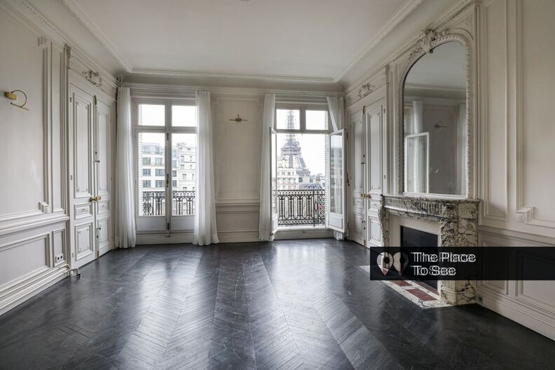 Empty Haussmannian office with Eiffel Tower view