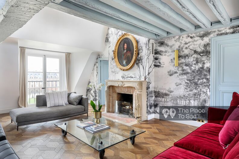 Under the roof duplex on the place des Vosges