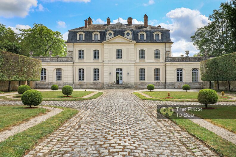 Colorful Louis XV style castle with beautiful park