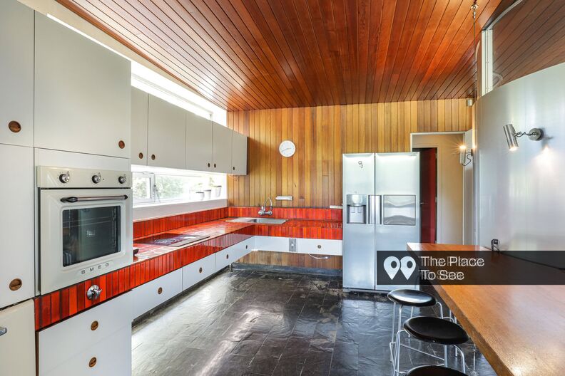 70's style architect's house with a pool