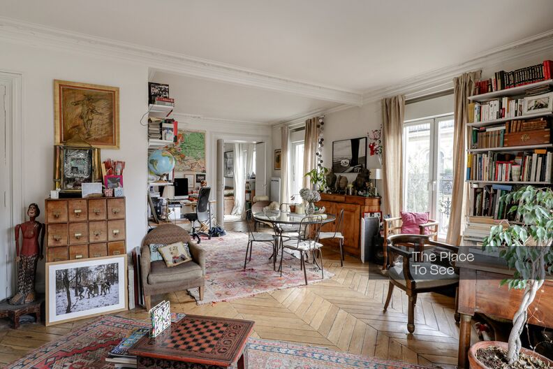 Bohemian and Parisian apartment filled with books
