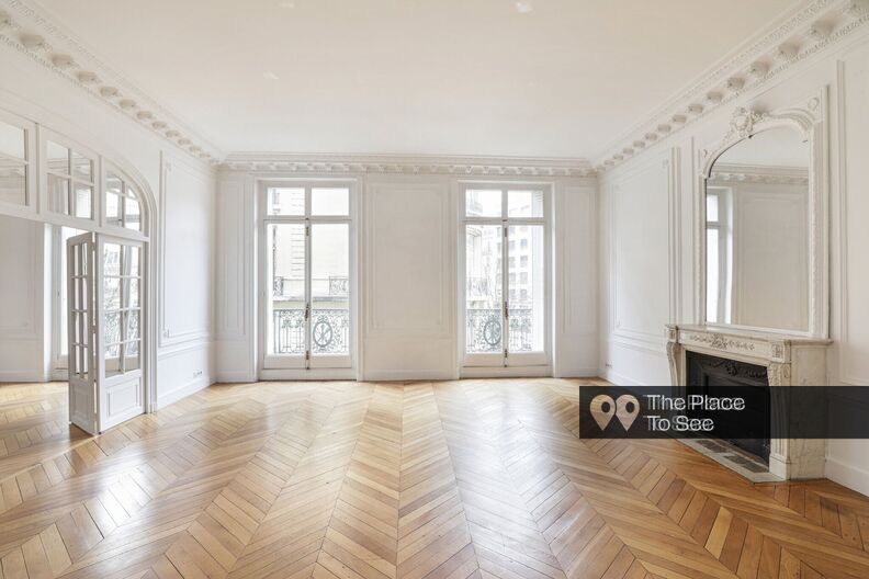 Large empty Haussmannian apartment with white walls