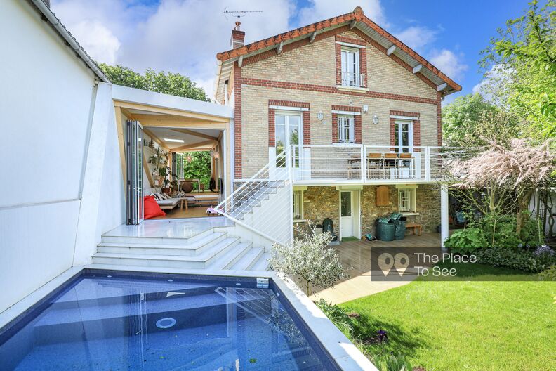 Brick house with extension and swimming pool