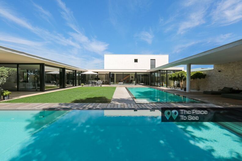 Designer house with two swimming pools
