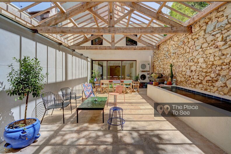 Modern loft with patio and pond