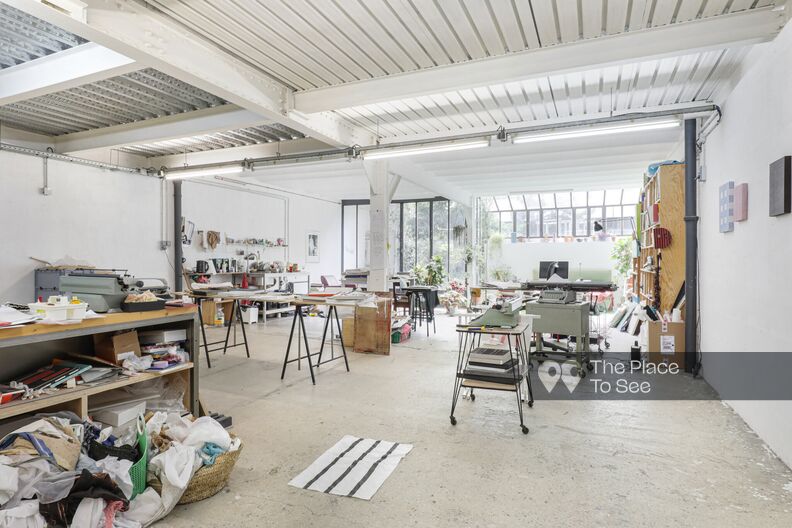 Raw industrial space with small glass roof