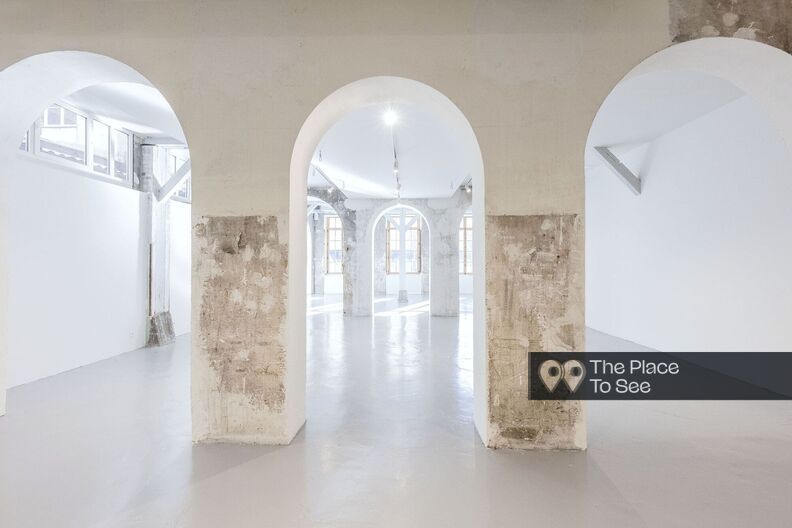 Industrial Art gallery raw walls and concrete floor