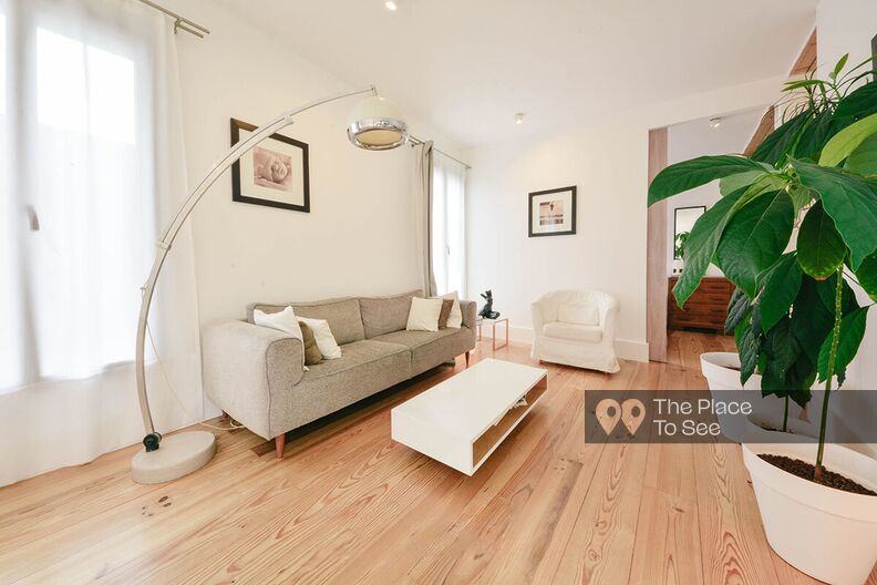 Architect-designed wooden house with patio