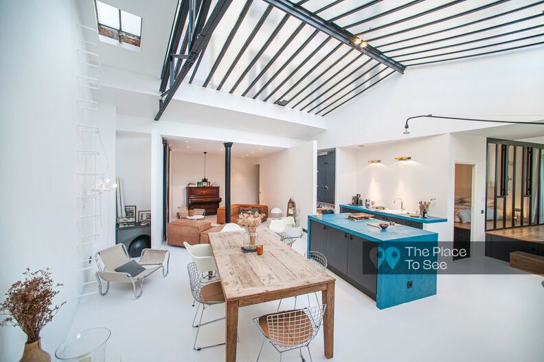 Architect's loft under glass roof