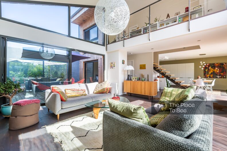 Loft house with wooden facade