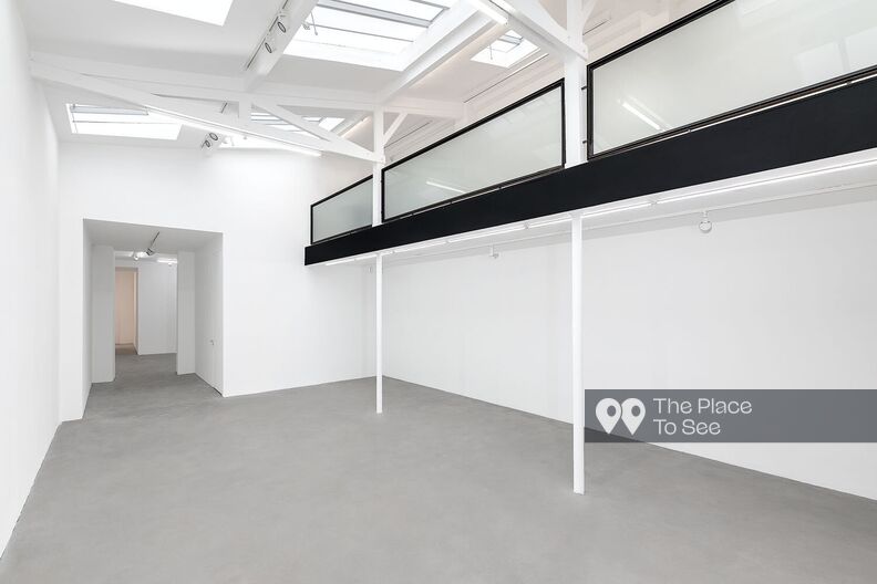 Contemporary gallery with concrete floor