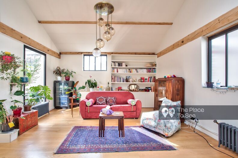 Simple duplex loft with exposed beams