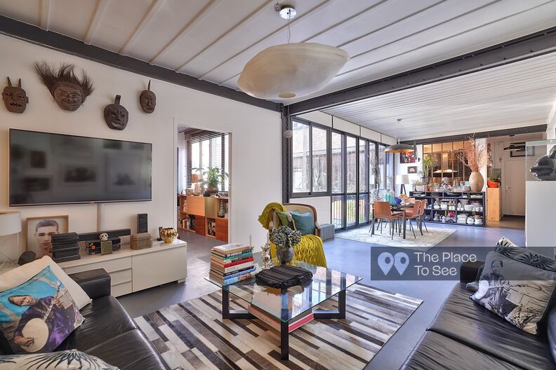 Industrial loft on interior courtyard with glass roof