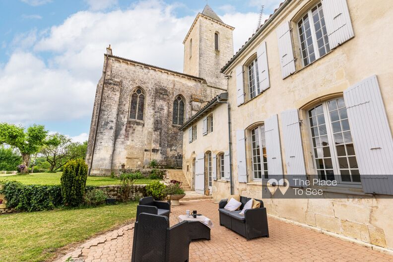 Old renovated presbytery with stone fireplace