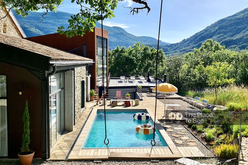 Farmhouse restored into designer house with swimming pool