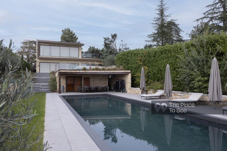 Contemporary minimalist house with large swimming pool