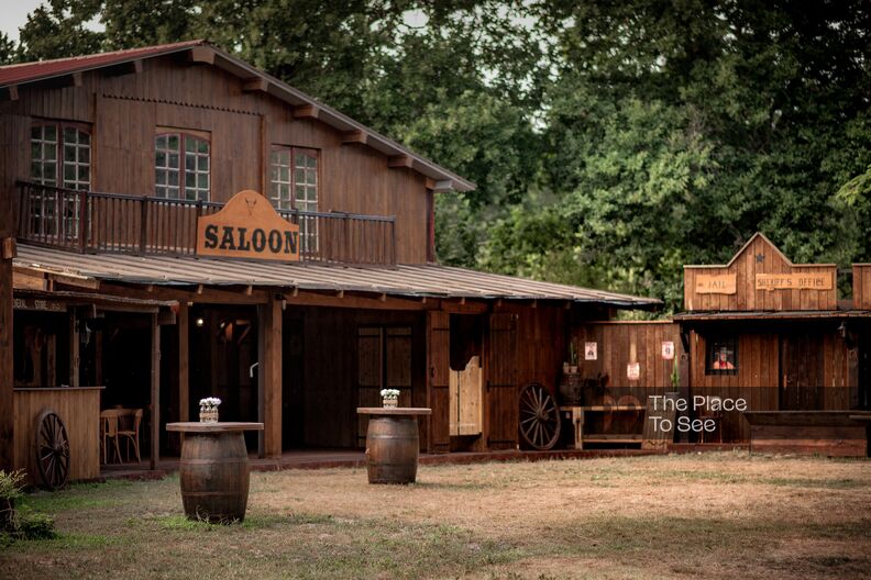 A real western saloon with horses and a swimming pool