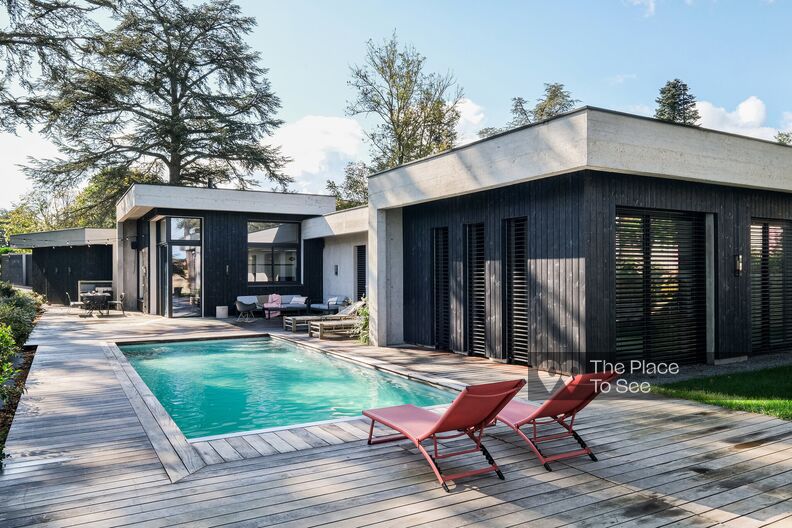 Architect's house with concrete frame and designer decoration