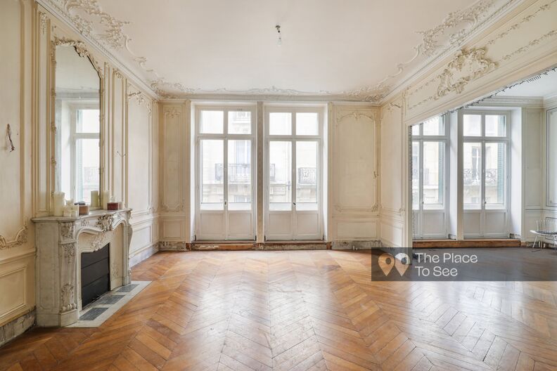 Empty and raw private mansion with faded and tagged walls