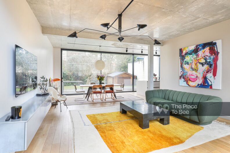 Architect's house with concrete and large bay windows