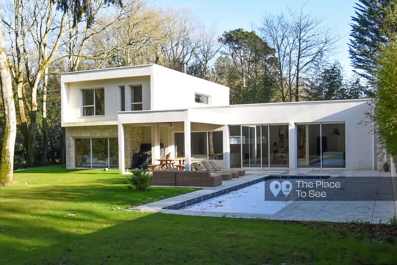 White architect's house in the forest