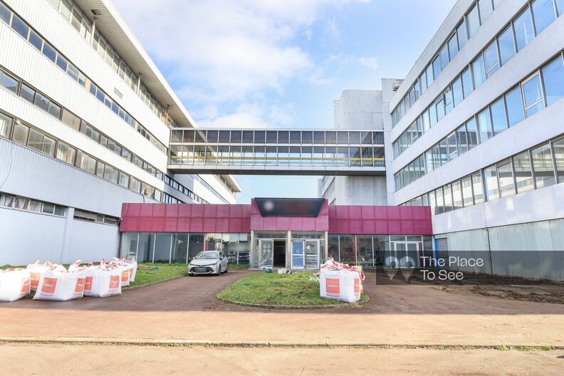 Set of empty buildings with walkway and rooftop