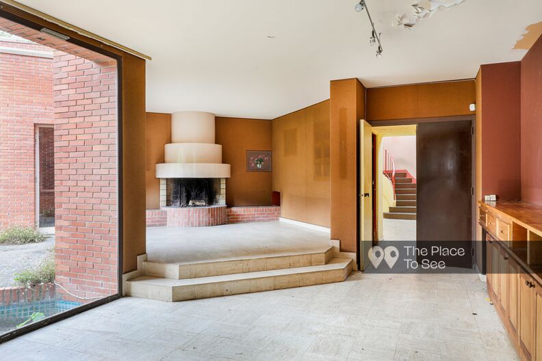 Empty and weathered 1960s brick villa