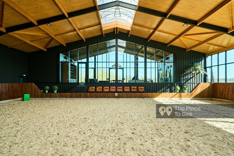 Beautiful stables with large bay windows and indoor and outdoor riding arena