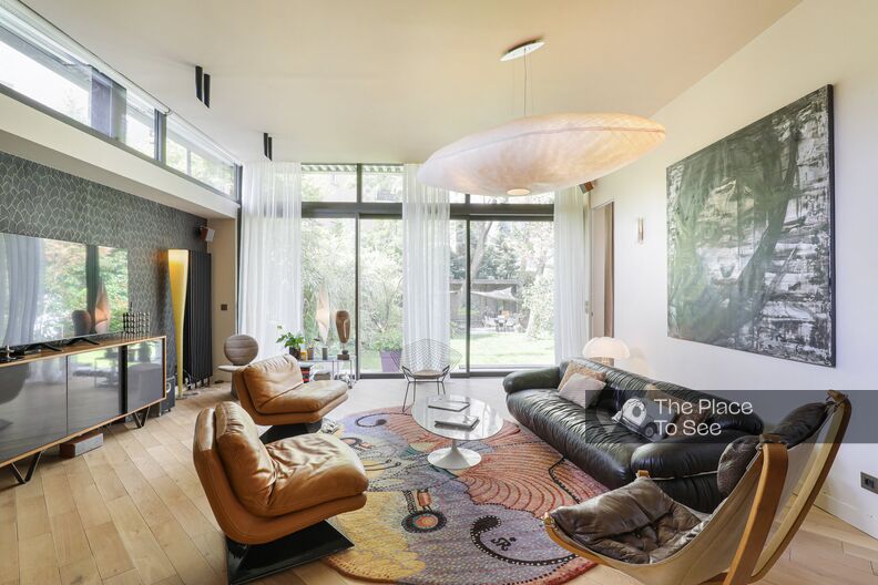 Loft-style apartment with contemporary extension and garden