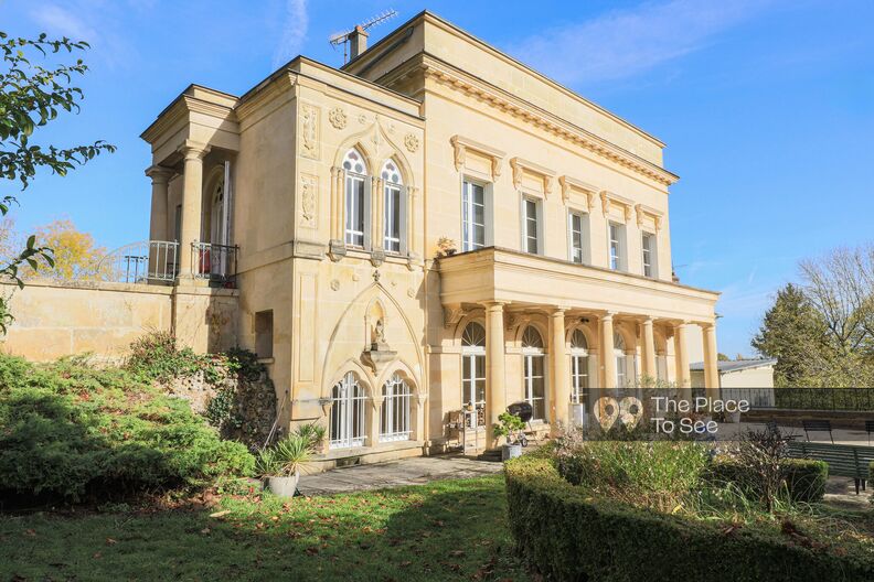 Historic 1830 residence featuring a Neo-Gothic Palladian façade