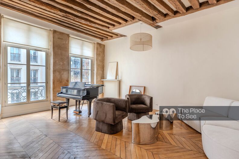 Charming renovated apartment in historic Paris, offering views of the Centre Pompidou