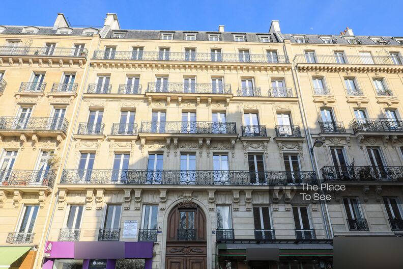 Charming common areas and historic maid’s rooms in a Haussmannian building