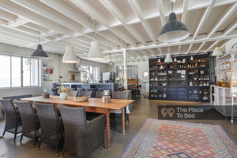 Industrial country loft with bohemian charm, boutique space and pool
