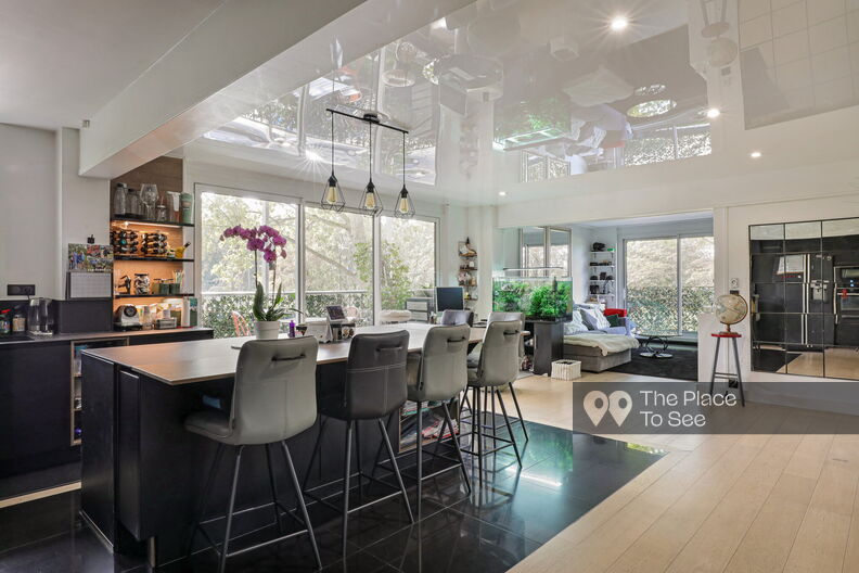 Modern apartment with open-plan kitchen and central island