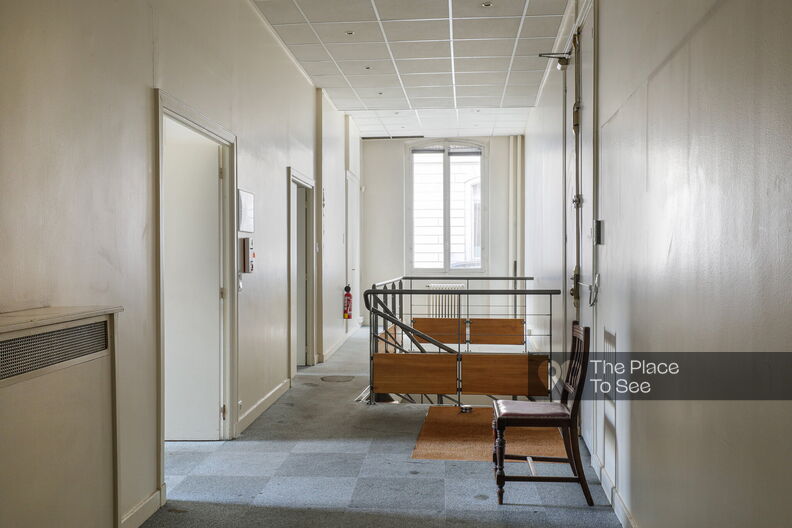 Split-level offices on the ground floor of a Haussmann-style building