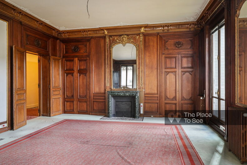 Vacant offices with wood panelling, fireplaces and carpeted floors